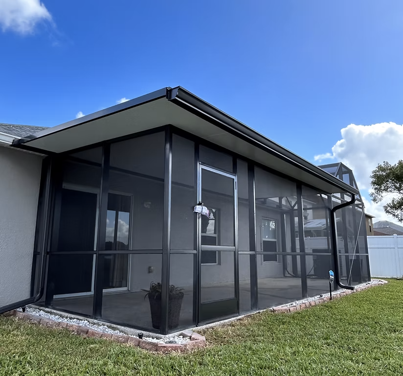 Lanai screen enclosure installation in Kissimmee, FL attached to residential home